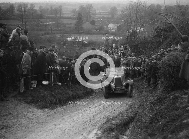 Alvis of RC Porter competing in the MCC Exeter Trial, Ibberton Hill, Dorset, 1930. Artist: Bill Brunell.