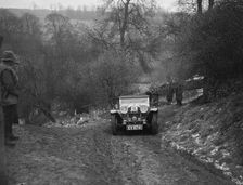 Alvis Silver Eagle of EW Bass competing in the Sunbac Colmore Trial, Gloucestershire, 1933. Artist: Bill Brunell