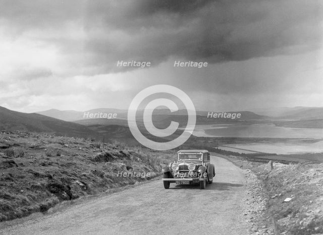Alvis Speed Twenty saloon competing in the RSAC Scottish Rally, 1934. Artist: Bill Brunell.