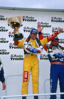 Alain Menu.British touring car driver celebrates victory