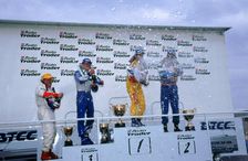 Alain Menu.British touring car driver celebrates victory