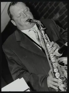 Alan Barnes (alto saxophone) playing at The Fairway, Welwyn Garden City, Hertforrdshire, 2002. Creator: Denis Williams