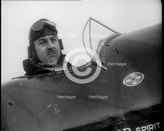 Alan Cobham in the Cockpit of a Plane, 1930s. Creator: British Pathe Ltd.