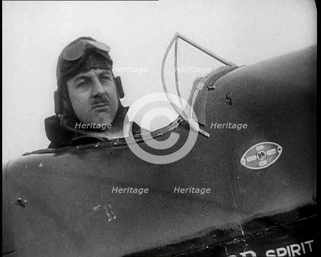 Alan Cobham in the Cockpit of a Plane, 1930s. Creator: British Pathe Ltd.