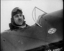 Alan Cobham in the Cockpit of a Plane, 1930s. Creator: British Pathe Ltd