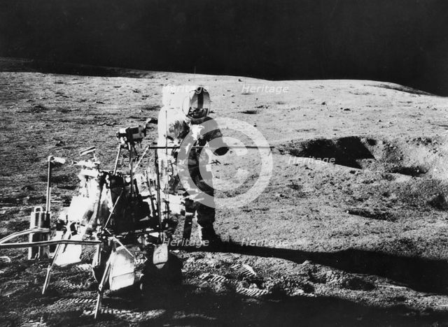 Alan Shepard (1923-1998) assembling lunar hand tools during the Apollo 14 mission, 1971. Artist: Unknown