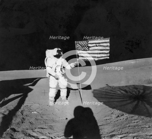 Alan Shepard (1923-1998) planting an American flag during the Apollo 14 mission, 1971. Artist: Unknown