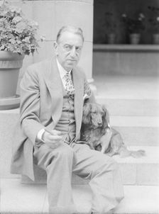 Alanson, Bertram, Mr., with dog, seated on steps, 1927 Creator: Arnold Genthe