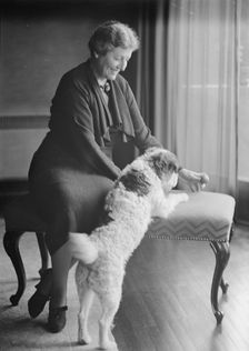 Alanson, Bertram, Mrs., with dog, portrait photograph, between 1927 and 1937. Creator: Arnold Genthe