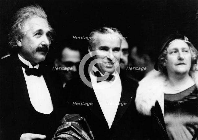 Albert Einstein (1879-1955) with his wife and Charlie Chaplin (1889-1977), 1931. Creator: Unknown.