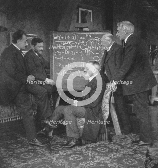Albert Einstein and other physicists at Paul Ehrenfest's home, Leyden, Netherlands. Creator: Unknown.