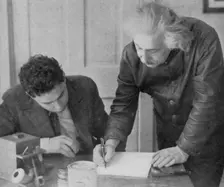 Albert Einstein, German-Swiss-American mathematician and physicist, with a student. Creator: Unknown
