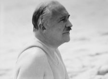 Albert Herter at the beach, between 1932 and 1942. Creator: Arnold Genthe