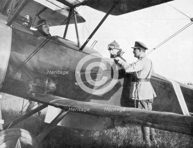 Albert I of Belgium, leaving by plane to visit the lines of the Yser, c1917. Artist: Unknown