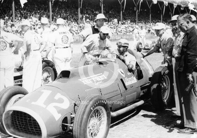 Alberto Ascari at the wheel of a 4.5 litre Ferrari, Indianapolis, 1952. Artist: Unknown