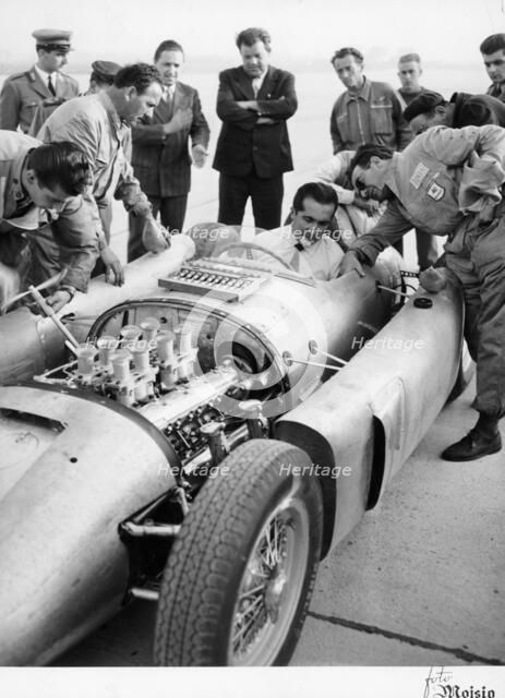 Alberto Ascari at the wheel of the new Lancia Grand Prix car, 1955. Artist: Unknown