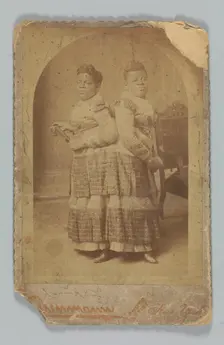 Albumen print of Millie and Christine McCoy, 1880s -1890s. Creator: Charles Eisenmann