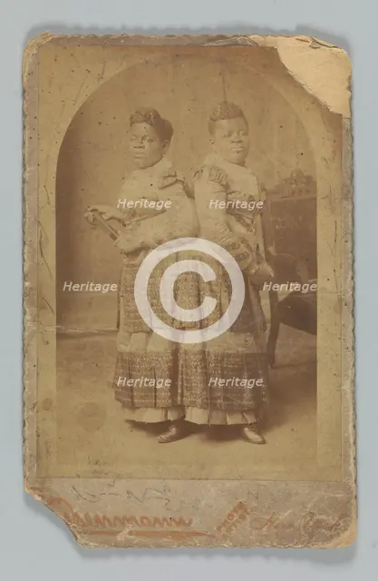 Albumen print of Millie and Christine McCoy, 1880s -1890s. Creator: Charles Eisenmann.