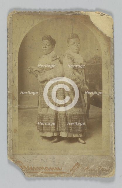 Albumen print of Millie and Christine McCoy, 1880s -1890s. Creator: Charles Eisenmann.