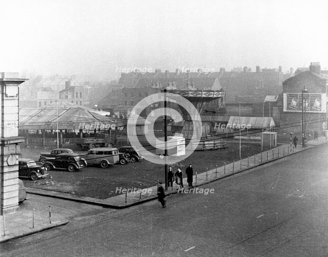 Aldgate Funfair, London, 1950s. Creator: Henry Grant.