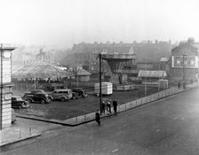 Aldgate Funfair, London, 1950s. Creator: Henry Grant