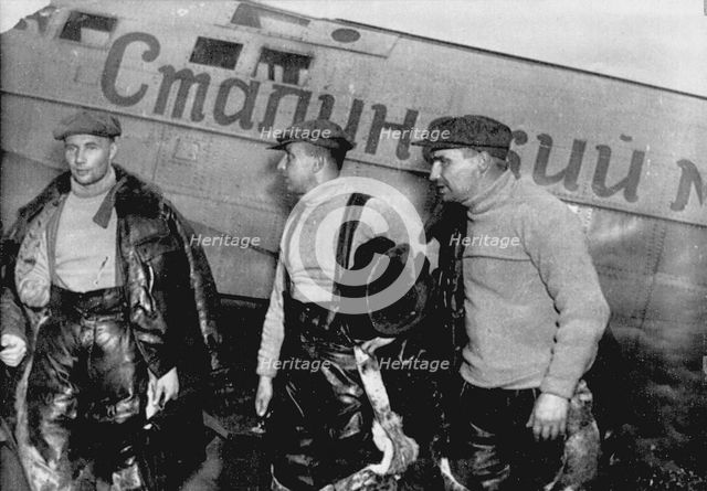 Alexander Belyakov, Georgiy Baidukov and Valery Chkalov by their plane on June 20, 1937. Artist: Anonymous  