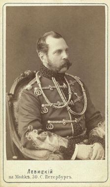 Alexander II, Emperor of Russia, half-length portrait, seated, facing right, between 1870 and 1886. Creator: Unknown
