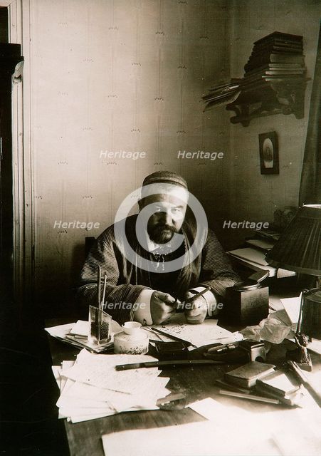 Alexander Kuprin, Russian author, at his desk, Gatchina, Russia, early 20th century.  Artist: Karl Karlovich Bulla