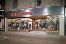Alexandre of Oxford Street, men's clothes shop frontage, Mexborough, South Yorkshire, 1963. Creator: Michael Walters