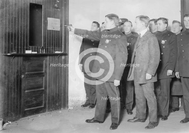 Alf. Plane -- teaching police to shoot, between c1910 and c1915. Creator: Bain News Service.