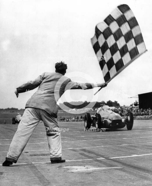 Alfa Romeo 158, Nino Farina winning International Trophy race at Silverstone in 1950. Creator: Unknown.