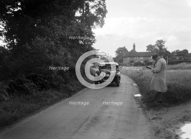Alfa Romeo taking part in a First Aid Nursing Yeomanry trial or rally, 1931. Artist: Bill Brunell.