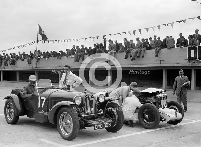 Alfa Romeo and supercharged MG Midget on the start line at Brooklands, 1938 or 1939. Artist: Bill Brunell.