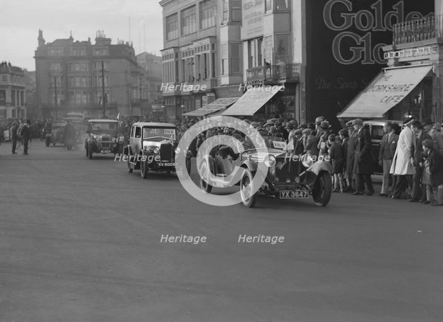 Alfa Romeo and Riley taking part in the London-Brighton Run, 1928. Artist: Bill Brunell.