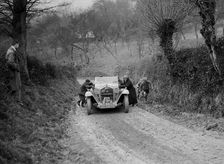 Alfa Romeo of KD Evans getting a push at the NWLMC London-Gloucester Trial, 1931. Artist: Bill Brunell