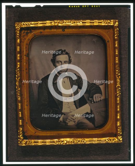 Alfred Francis Russell, three-quarter length portrait, full face, seated..., between 1856 and 1858. Creator: Augustus Washington.
