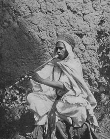 Algerian native flute player, 1912