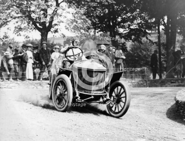 Algernon Guinness driving a Minerva in the Circuit des Ardennes, 1907. Artist: Unknown