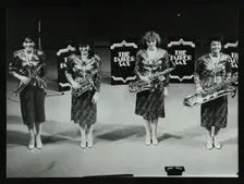 All-female quartet The Fairer Sax on stage at the Forum Theatre, Hatfield, Hertfordshire, 1987. Creator: Denis Williams