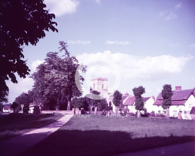 All Saints' Church and village green at Sutton Courtenay, Berkshire, c1955.  Creator: Arthur Charles Kirby Ware.