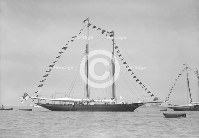'Allah Karim' at anchor, 1911. Creator: Kirk & Sons of Cowes.