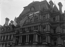 Allied Commission To U.S - Allied Flags On State Department, 1917. Creator: Harris & Ewing