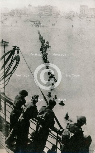 Allied troops wait for a ship during the Dunkirk evacuation, 1940. Creator: Unknown.