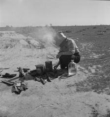 Along a California highway, a dust bowl refugee bound for Oregon, 1937. Creator: Dorothea Lange