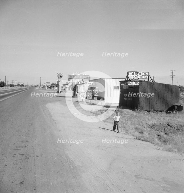 Along the highway U.S. 99 at Highway City, between Tulare and Fresno, California, 1939. Creator: Dorothea Lange.