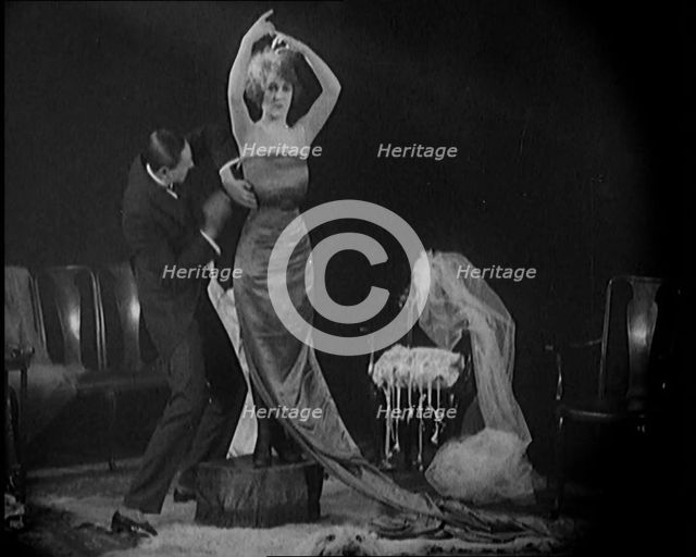Alphonse Berge, Famous Fashion Designer,  Constructing a Dress, a Female Civilian Model..., 1920. Creator: British Pathe Ltd.