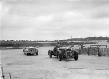 AP Watson's Lagonda and AS Lusty's Riley Lynx at the chicane, JCC Members Day, Brooklands, 1939. Artist: Bill Brunell