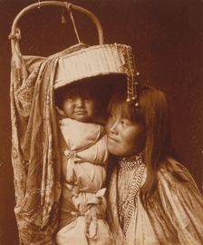 Apache girl and papoose, c1903. Creator: Edward Sheriff Curtis