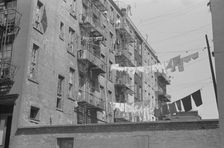 Apartment houses from the rear, 61st Street between 1st and 3rd Avenues, New York, 1938. Creator: Walker Evans