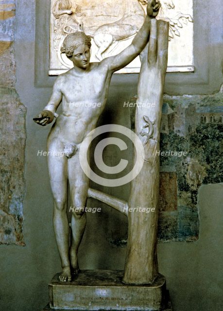 Apollo Sauróctonos, work by Praxiteles preserved in the Vatican Museums .